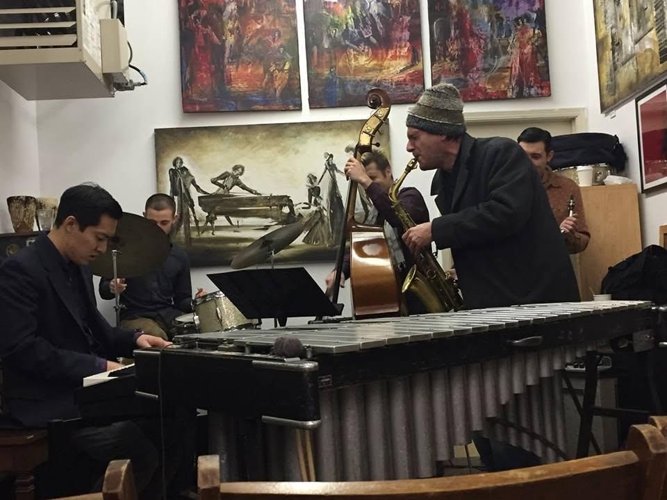 Dan leaning into the horn over the vibraphone